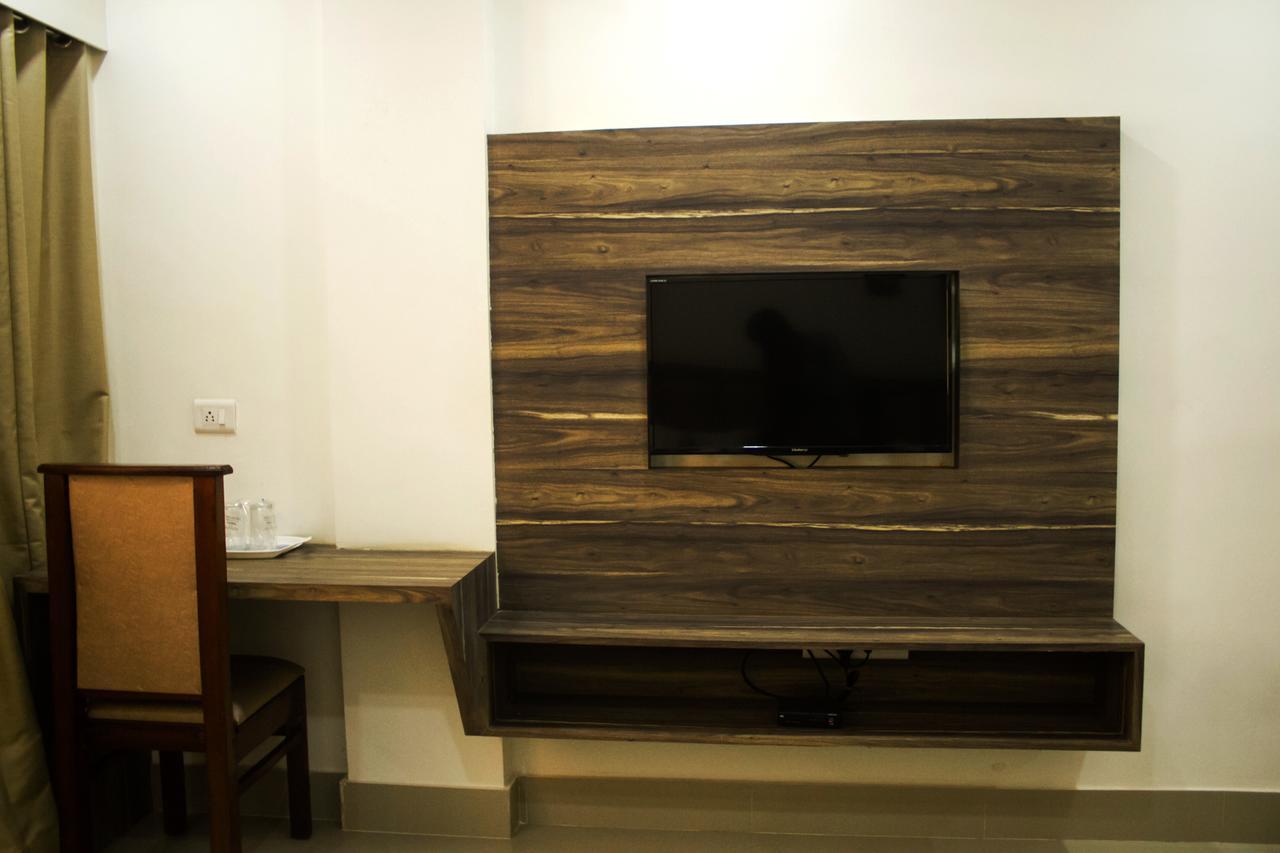 Nexstay Crystal Residency Kozhikode Exteriör bild