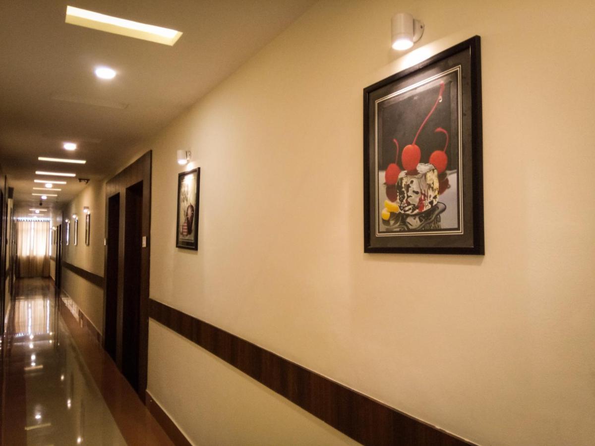 Nexstay Crystal Residency Kozhikode Exteriör bild