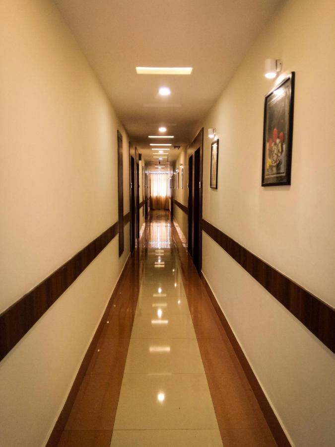 Nexstay Crystal Residency Kozhikode Exteriör bild