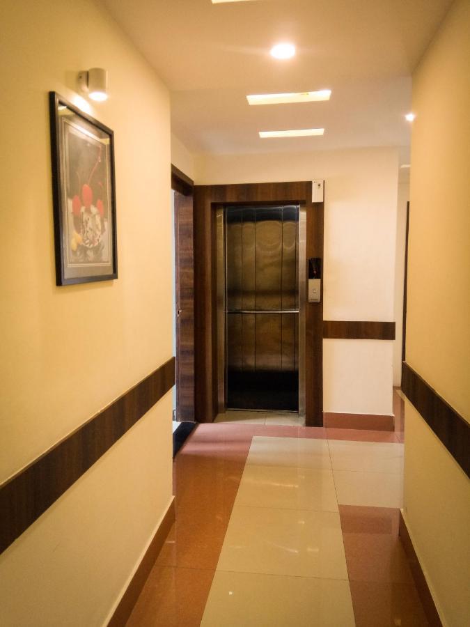 Nexstay Crystal Residency Kozhikode Exteriör bild